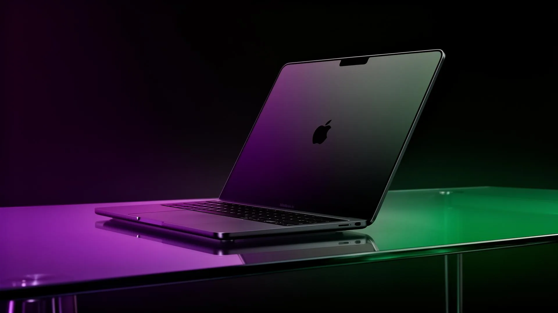 MacBook Air M5 in midnight finish on dark glass with purple and emerald light — UAE review 2026